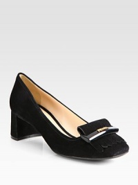 Suede block heel design with hardware and fringe detail. Suede heel, 1¾ (45mm)Suede upperLeather lining and rubber solePadded insoleImported Suede block heel design with hardware and fringe detail. Suede heel, 1¾ (45mm)Suede upperLeather lining and rubber solePadded insoleImported