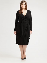 Featuring a universally flattering, faux-wrap front, this soft crepe design was designed to comfortably complement your curves. V-neckLong sleevesSelf-tie beltAbout 28 from natural waist72% viscose/28% polyesterHand washImported Featuring a universally flattering, faux-wrap front, this soft crepe design was designed to comfortably complement your curves. V-neckLong sleevesSelf-tie beltAbout 28 from natural waist72% viscose/28% polyesterHand washImported