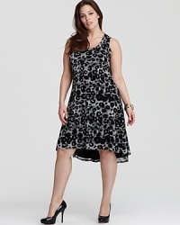 Enlivened by a graphic cheetah print, this Karen Kane Plus dress ensures spot-on summer style. Tame the look with sleek, black accents for a restrained walk on the wild side. Enlivened by a graphic cheetah print, this Karen Kane Plus dress ensures spot-on summer style. Tame the look with sleek, black accents for a restrained walk on the wild side.