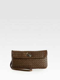 Finely woven nappa lambskin in a chic, handy silhouette with a classic toggle closure.Crossbody strap, 22 drop Toggle flap closure Suede lining 10W X 5H X ¼D Made in Italy Finely woven nappa lambskin in a chic, handy silhouette with a classic toggle closure.Crossbody strap, 22 drop Toggle flap closure Suede lining 10W X 5H X ¼D Made in Italy