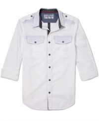 Not so strictly uniform: DKNY Jeans does a military-style sports shirt complete with epaulets and double chest pockets, then does buttons and inner plackets in an unexpected contrast color. Not so strictly uniform: DKNY Jeans does a military-style sports shirt complete with epaulets and double chest pockets, then does buttons and inner plackets in an unexpected contrast color.