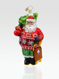 Crafted for the outdoor enthusiast, Santa makes his way up the snowy mountainside while carrying a festive tree and sled. Hand-blownHand-painted6 highMade in Poland Crafted for the outdoor enthusiast, Santa makes his way up the snowy mountainside while carrying a festive tree and sled. Hand-blownHand-painted6 highMade in Poland