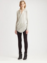 Crossover v-neck and figure-enhancing draping enliven this alarmingly soft jersey top. Crossover draped v-neckLong sleevesCrossover front drapeAsymmetrical hemAbout 31 from shoulder to hemMicromodalDry cleanImportedModel shown is 5'10 (177cm) wearing US size Small. Crossover v-neck and figure-enhancing draping enliven this alarmingly soft jersey top. Crossover draped v-neckLong sleevesCrossover front drapeAsymmetrical hemAbout 31 from shoulder to hemMicromodalDry cleanImportedModel shown is 5'10 (177cm) wearing US size Small.
