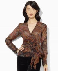 Lauren Ralph Lauren's flowing silk blouse is crafted in a flattering wrap silhouette for breezy, feminine appeal. Lauren Ralph Lauren's flowing silk blouse is crafted in a flattering wrap silhouette for breezy, feminine appeal.