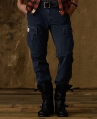 Keeping with the rough-and-tough feel of cargos but with a modern slim fit, this uniform pant covers all the essentials with durable fabric, utility side pockets and drawstrings at the hem for a kick of killer style. Keeping with the rough-and-tough feel of cargos but with a modern slim fit, this uniform pant covers all the essentials with durable fabric, utility side pockets and drawstrings at the hem for a kick of killer style.