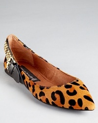 A heavily studded strap at the heel lends an edgy look to STEVEN BY STEVE MADDEN's Eavan flats. A heavily studded strap at the heel lends an edgy look to STEVEN BY STEVE MADDEN's Eavan flats.