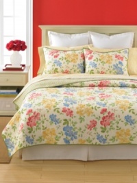Dream in color. Cheerful watercolor flowers embellish allover quilting for a sensational, seasonless allure. Striped reverse. Dream in color. Cheerful watercolor flowers embellish allover quilting for a sensational, seasonless allure. Striped reverse.