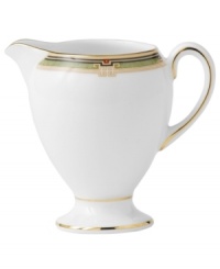 This enchanting pattern features a pale green border dotted with vivid red hues for your tabletop while shimmering gold accents add to the allure of this unique creamer. From the Wedgwood dinnerware and dishes collection. This enchanting pattern features a pale green border dotted with vivid red hues for your tabletop while shimmering gold accents add to the allure of this unique creamer. From the Wedgwood dinnerware and dishes collection.