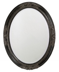 Feel like royalty in the presence of the Queen Ann oval mirror. Elegant flourishes and inner beading dressed in dramatic black grace an antique-inspired frame. Feel like royalty in the presence of the Queen Ann oval mirror. Elegant flourishes and inner beading dressed in dramatic black grace an antique-inspired frame.