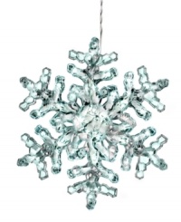 Let it glow. Twinkling clear lights fill a larger-than-life snowflake in this whimsical Christmas decoration from Kurt Adler. Let it glow. Twinkling clear lights fill a larger-than-life snowflake in this whimsical Christmas decoration from Kurt Adler.