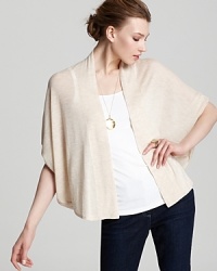 The relaxed, open styling of this draped Eileen Fisher cardigan lends itself to layering, topping your closet favorites with luxe lightweight warmth. The relaxed, open styling of this draped Eileen Fisher cardigan lends itself to layering, topping your closet favorites with luxe lightweight warmth.