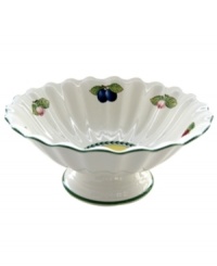 Adorned with fresh summer fruits, this porcelain fruit bowl transforms your kitchen into a lush French garden. A fluted shape and sunny hues make it a delightful accompaniment to the mix-and-match Villeroy & Boch dinnerware collection. Adorned with fresh summer fruits, this porcelain fruit bowl transforms your kitchen into a lush French garden. A fluted shape and sunny hues make it a delightful accompaniment to the mix-and-match Villeroy & Boch dinnerware collection.