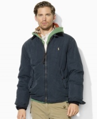 A rugged representation of a classic windbreaker, this cotton poplin jacket offers lightweight warmth and comfort with a cozy filling. A rugged representation of a classic windbreaker, this cotton poplin jacket offers lightweight warmth and comfort with a cozy filling.