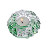 Inspired by the natural opulence of dazzling gemstones, designer Lena Bergström has crafted this brilliant votive in the true spirit of Orrefors for a sparkly addition to your home décor. Inspired by the natural opulence of dazzling gemstones, designer Lena Bergström has crafted this brilliant votive in the true spirit of Orrefors for a sparkly addition to your home décor.