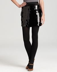 Rectangular pailettes lend a modern look to DKNY's embellished skirt, crafted in stretch silk for a perfect fit. Rectangular pailettes lend a modern look to DKNY's embellished skirt, crafted in stretch silk for a perfect fit.