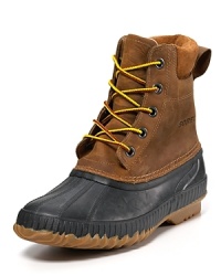 This rugged all-weather boot from Sorel keeps you warm and dry under any conditions, with a rubber shell toe and textured sides, waterproof leather upper and padded collar. This rugged all-weather boot from Sorel keeps you warm and dry under any conditions, with a rubber shell toe and textured sides, waterproof leather upper and padded collar.