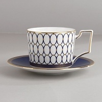 Embellished with intricate garlands, oval links and a fanciful dragon motif, this Wedgwood dinnerware evokes Europe's glorious Renaissance period. Rendered in deep blue and gold to transform any formal meal into a spectacular royal gala. Embellished with intricate garlands, oval links and a fanciful dragon motif, this Wedgwood dinnerware evokes Europe's glorious Renaissance period. Rendered in deep blue and gold to transform any formal meal into a spectacular royal gala.