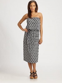 A strapless maxi dress featuring an eye-catching print and waist-cinching belt.Elasticized, strapless topAllover printElasticized waistBelted silhouetteAbout 31 from natural waist95% polyester/5% spandexMachine washImported Model shown is 5'10 (177cm) wearing US size Small. A strapless maxi dress featuring an eye-catching print and waist-cinching belt.Elasticized, strapless topAllover printElasticized waistBelted silhouetteAbout 31 from natural waist95% polyester/5% spandexMachine washImported Model shown is 5'10 (177cm) wearing US size Small.