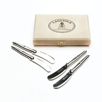 Serve in style with elegant cheese spreaders from Dubost. Packed in an artisinal storage box, it is refined and chic, an entertaining must. Serve in style with elegant cheese spreaders from Dubost. Packed in an artisinal storage box, it is refined and chic, an entertaining must.