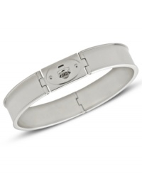 A classic bangle bracelet from Fossil with an iconic turnlock closure. Includes hinges. Crafted in polished stainless steel. Approximate diameter: 2 5/8 inch. A classic bangle bracelet from Fossil with an iconic turnlock closure. Includes hinges. Crafted in polished stainless steel. Approximate diameter: 2 5/8 inch.