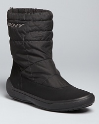 Urbane fashion meets function in these sporty DKNY all weather boots, that reflect the city slick, futuristic-meets-active brand aesthetic. Urbane fashion meets function in these sporty DKNY all weather boots, that reflect the city slick, futuristic-meets-active brand aesthetic.