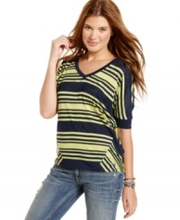 Panels of asymmetrical stripes at the sides add cool variation to this comfy-casual top from Tommy Girl! Panels of asymmetrical stripes at the sides add cool variation to this comfy-casual top from Tommy Girl!