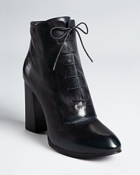 Lace into a style for life: CoSTUME NATIONAL does it again with a modern take on the ankle bootie. Wide spaced laces update the look while a size zip makes them easy to pull on. Lace into a style for life: CoSTUME NATIONAL does it again with a modern take on the ankle bootie. Wide spaced laces update the look while a size zip makes them easy to pull on.