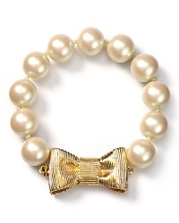 Wrap up everyday looks in classic fashion with kate spade new york's bow-bedecked bracelet. Wear the punchy pearls to make bare wrists appear more presentable. Wrap up everyday looks in classic fashion with kate spade new york's bow-bedecked bracelet. Wear the punchy pearls to make bare wrists appear more presentable.
