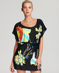 Lounge about in an elegant Trina Turk coverup tunic, highlighted with a pretty palette and graphic print. Lounge about in an elegant Trina Turk coverup tunic, highlighted with a pretty palette and graphic print.
