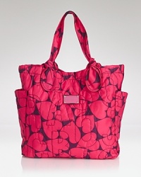 Tap into MARC BY MARC JACOBS' quirky brand of cool with the label's printed tote. In sporty-chic nylon, it's a high-energy favorite for lugging the essentials. Tap into MARC BY MARC JACOBS' quirky brand of cool with the label's printed tote. In sporty-chic nylon, it's a high-energy favorite for lugging the essentials.