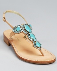 Translucent crystals rest atop shimmering metallic leather on a sleek and simple sandal silhouette. From IVANKA TRUMP. Translucent crystals rest atop shimmering metallic leather on a sleek and simple sandal silhouette. From IVANKA TRUMP.