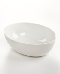 Keep it simple. In glossy white porcelain, this oval vegetable bowl is a flawless accompaniment to any dinnerware pattern and decor. From Martha Stewart Collection. Keep it simple. In glossy white porcelain, this oval vegetable bowl is a flawless accompaniment to any dinnerware pattern and decor. From Martha Stewart Collection.