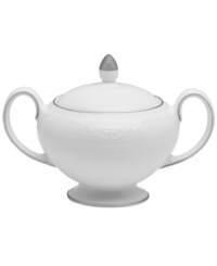 Like traditional embroidery, the Wedgwood English Lace sugar bowl is meticulously crafted with delicate florals, all embossed in fine bone china that's remarkably dishwasher safe. With platinum banding. Like traditional embroidery, the Wedgwood English Lace sugar bowl is meticulously crafted with delicate florals, all embossed in fine bone china that's remarkably dishwasher safe. With platinum banding.