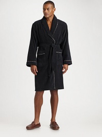 Plush cotton terrycloth offers renowned comfort before or after a shower, complete with a striped trim for a signature touch. Self belt and loops Patch pockets Calf length Pure cotton terrycloth Machine wash Imported Plush cotton terrycloth offers renowned comfort before or after a shower, complete with a striped trim for a signature touch. Self belt and loops Patch pockets Calf length Pure cotton terrycloth Machine wash Imported