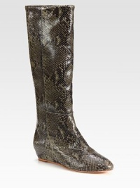 For instant exotic edge, try this tall silhouette of snake-print leather on a minimal wedge. Self-covered wedge, 1¼ (30mm)Shaft, 15½Leg circumference, 14Snake-print leather upperPull-on styleLeather lining and solePadded insoleImported For instant exotic edge, try this tall silhouette of snake-print leather on a minimal wedge. Self-covered wedge, 1¼ (30mm)Shaft, 15½Leg circumference, 14Snake-print leather upperPull-on styleLeather lining and solePadded insoleImported