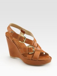 Burnished leather wedge with adjustable buckle straps and a covered platform. Self-covered wedge, 4 (100mm)Covered platform, 1 (25mm)Compares to a 3 heel (100mm)Leather upperLeather liningRubber solePadded insoleMade in SpainOUR FIT MODEL RECOMMENDS ordering true size. Burnished leather wedge with adjustable buckle straps and a covered platform. Self-covered wedge, 4 (100mm)Covered platform, 1 (25mm)Compares to a 3 heel (100mm)Leather upperLeather liningRubber solePadded insoleMade in SpainOUR FIT MODEL RECOMMENDS ordering true size.