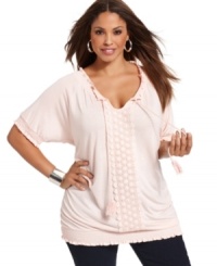 Indulge in the casual elegance of INC's short sleeve plus size peasant top, accented by crochet trim. Indulge in the casual elegance of INC's short sleeve plus size peasant top, accented by crochet trim.