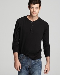 This soft and mellow henley does the trick when you need a casual tee that has rugged appeal. This soft and mellow henley does the trick when you need a casual tee that has rugged appeal.