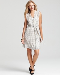 A delicate Swiss dot pattern envelopes this flirty Tory Burch day dress, with pleating accents and pintuck details for trend-right retro flair. A delicate Swiss dot pattern envelopes this flirty Tory Burch day dress, with pleating accents and pintuck details for trend-right retro flair.