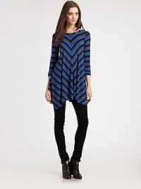 Covered in contrasting chevron stripes and finished with an asymmetrical hem, this ultra-soft knit is the perfect balance between ease and elegance. RoundneckRolled three-quarter sleevesAsymmetrical hemBack keyhole detail96% rayon/4% spandexDry cleanMade in USAModel shown is 5'10 (177cm) wearing US size Small. Covered in contrasting chevron stripes and finished with an asymmetrical hem, this ultra-soft knit is the perfect balance between ease and elegance. RoundneckRolled three-quarter sleevesAsymmetrical hemBack keyhole detail96% rayon/4% spandexDry cleanMade in USAModel shown is 5'10 (177cm) wearing US size Small.