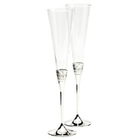 The With Love Toasting Flutes are the perfect addition when celebrating your most memorable moments. The flute pair is delicately accented by silver bands that replicate Vera Wang's most iconic jewelry collection. The With Love Toasting Flutes are the perfect addition when celebrating your most memorable moments. The flute pair is delicately accented by silver bands that replicate Vera Wang's most iconic jewelry collection.
