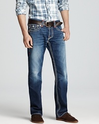 Bold stitching detail and sharp contrasts between the wash and fade highlight these assertive jeans from True Religion, cut with a straight leg for classic appeal. Bold stitching detail and sharp contrasts between the wash and fade highlight these assertive jeans from True Religion, cut with a straight leg for classic appeal.