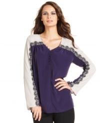 Lace trim adds a feminine edge to this two-tone colorblocked Alfani top for an on-trend fall look!