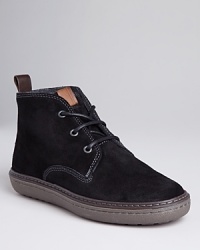 Fred Perry elevates the cozy chukka boot with smooth suede fabrication to make it an easily stylish choice for casual Friday - or laidback Saturday. Fred Perry elevates the cozy chukka boot with smooth suede fabrication to make it an easily stylish choice for casual Friday - or laidback Saturday.