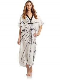 THE LOOKUnderstated tie-dyed print on fine silk habotaiBeaded V-necklineRuched center with beaded bandShort caftan sleevesTHE FITAbout 52 from shoulder to hemTHE MATERIALSilkCARE & ORIGINHand washImportedModel shown is 5'11 (180cm) wearing US size Small. THE LOOKUnderstated tie-dyed print on fine silk habotaiBeaded V-necklineRuched center with beaded bandShort caftan sleevesTHE FITAbout 52 from shoulder to hemTHE MATERIALSilkCARE & ORIGINHand washImportedModel shown is 5'11 (180cm) wearing US size Small.