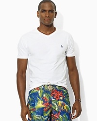 The ultimate essential for everyday wear, a classic T-shirt is tailored from ultra-soft cotton in a contemporary v-neck silhouette. The ultimate essential for everyday wear, a classic T-shirt is tailored from ultra-soft cotton in a contemporary v-neck silhouette.