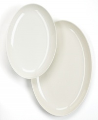 Keep it simple. In glossy white porcelain, this oval serving platter is a flawless accompaniment to any dinnerware pattern and decor. From Martha Stewart Collection. Keep it simple. In glossy white porcelain, this oval serving platter is a flawless accompaniment to any dinnerware pattern and decor. From Martha Stewart Collection.