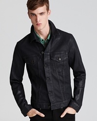 Sleek and stylish, classic and cool, this denim jacket ups the ante with a coated surface that resembles the look and luster of timeworn leather. Sleek and stylish, classic and cool, this denim jacket ups the ante with a coated surface that resembles the look and luster of timeworn leather.