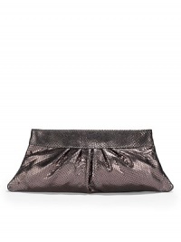 THE LOOKSnakeskin-embossed metallic Italian lambskinTrapezoid shapeOpens with hexagonal frameFrame top closureInside logo detailIncludes signature dust bagTHE MEASUREMENT14W X 5½H X ½DTHE MATERIALItalian lambskinStriped jacquard liningORIGINMade in USA