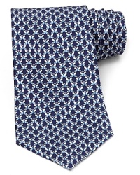 The Russian novelist Vladimir Nabokov, a longtime butterfly enthusiast, would be proud to wear this astute tie from Salvatore Ferragamo, rendered in sumptuous Italian silk for classic luxury. The Russian novelist Vladimir Nabokov, a longtime butterfly enthusiast, would be proud to wear this astute tie from Salvatore Ferragamo, rendered in sumptuous Italian silk for classic luxury.